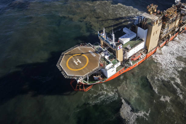 The Mafuta diamond mining vessel, operated by Debmarine Namibia, a joint venture between De Beers and the Namibian government, uses a 'crawler'...